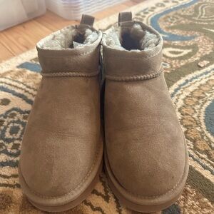 Mini Uggs. Received as gift, excellent used condition.